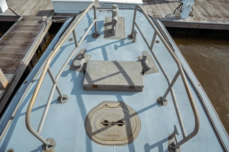 Slide: The Image of Bow view of a 2004 Kvichak Marine Industries Pilot boat docked at a marina. - 16