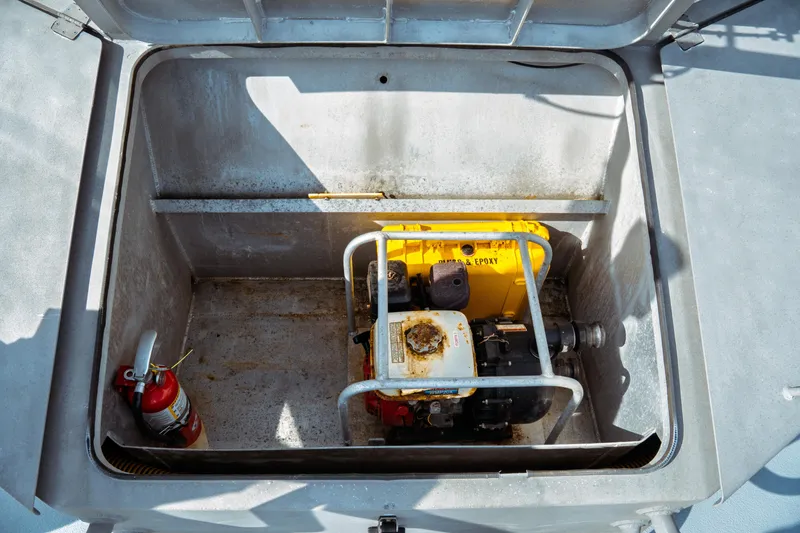 Slide: The Image of Open hatch on 2004 Kvichak Marine Industries Pilot boat showing equipment and fire extinguisher. - 18