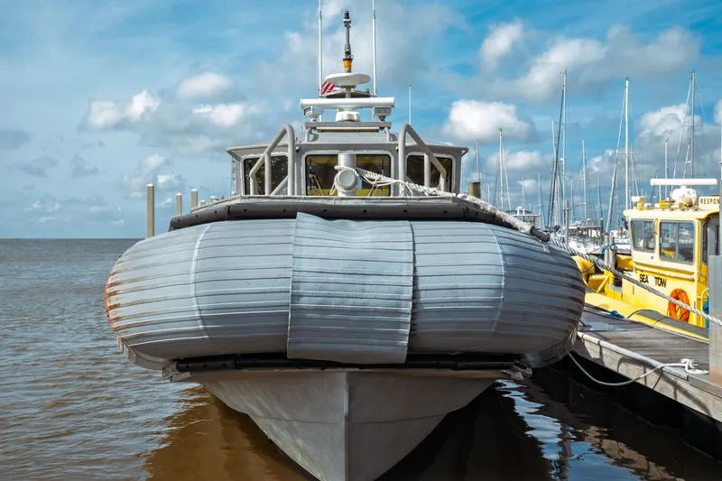 Slide: The Image of 2004 Kvichak Marine Industries Pilot boat docked at marina under blue sky. - 4
