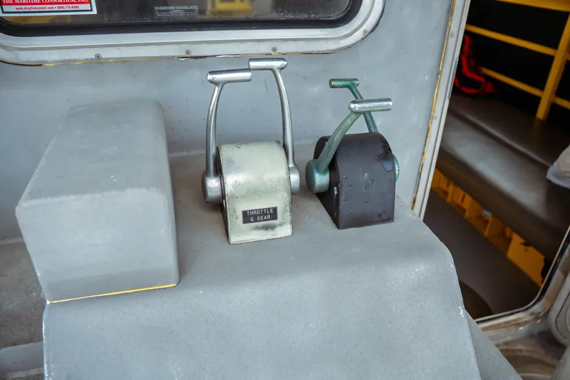 Slide: The Image of Throttle and gear controls on a 2004 Kvichak Marine Industries Pilot boat. - 47