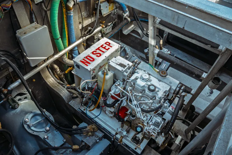 Slide: The Image of Engine compartment of a 2004 Kvichak Marine Industries Pilot boat, featuring "No Step" warning. - 51