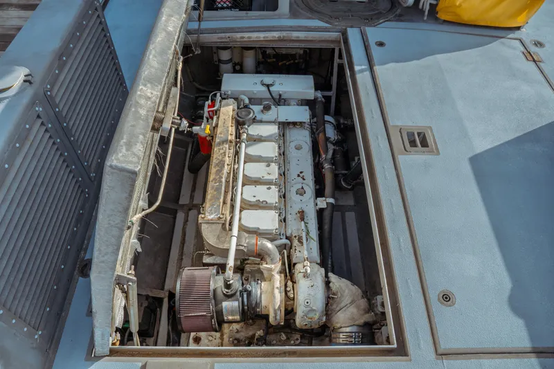 Slide: The Image of Engine compartment of a 2004 Kvichak Marine Industries Pilot boat, showcasing mechanical components. - 54