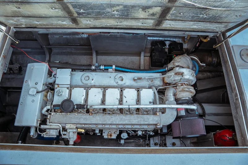 Slide: The Image of Engine compartment of a 2004 Kvichak Marine Industries Pilot boat, showcasing detailed machinery. - 57