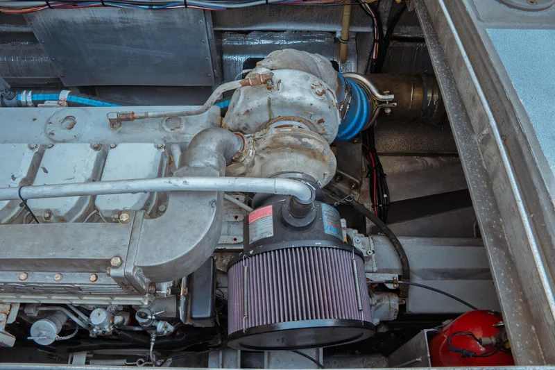 Slide: The Image of Engine compartment of a 2004 Kvichak Marine Industries Pilot boat, showcasing mechanical components. - 59