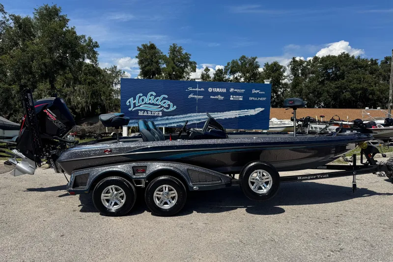 The Image of 2026 Ranger Z520 boat on trailer at Holiday Marine dealership. - 1