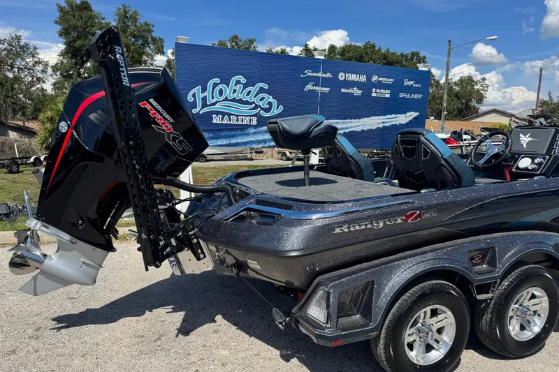 Slide: The Image of 2026 Ranger Z520 boat with powerful engine at Holiday Marine dealership. - 3