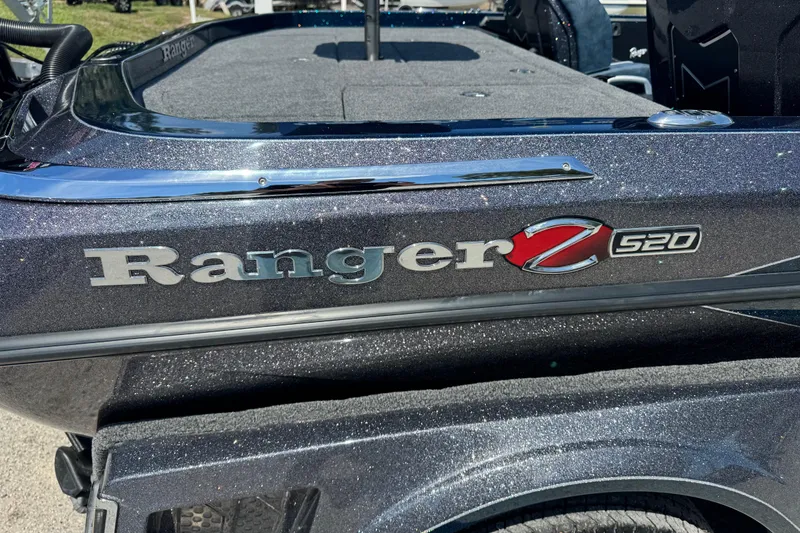 Slide: The Image of 2026 Ranger Z520 boat, metallic finish, close-up of logo and deck. - 4