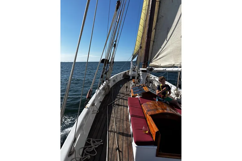 Slide: The Image of Sailing on a 2004 Custom Luke Powell Pilot Cutter, sunny day at sea. - 14