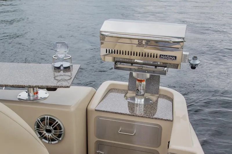 Slide: The Image of Manufacturer Provided Image: 2014 AquaPatio 220 WB boat with Magma grill and drink holders on deck. - 17