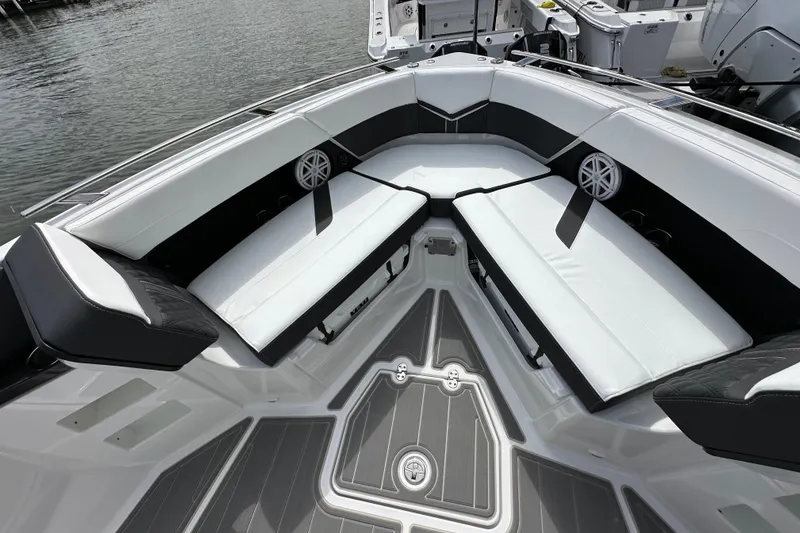 Slide: The Image of Luxurious seating area on 2026 Monterey Elite 30 OB boat, featuring sleek design and modern upholstery. - 12