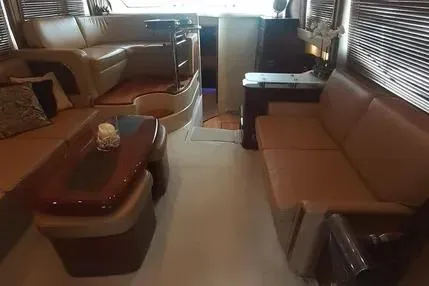 Slide: The Image of 2005 Sea Ray 420 Sedan Bridge interior with luxurious seating and elegant decor. - 11