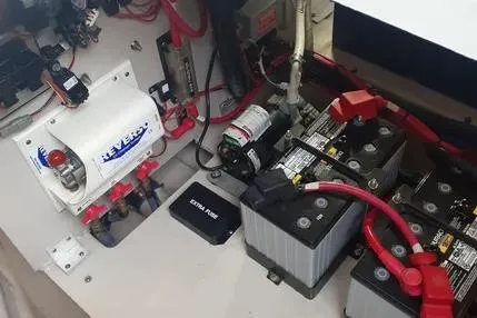 Slide: The Image of Electrical system of a 2005 Sea Ray 420 Sedan Bridge with batteries and wiring. - 22