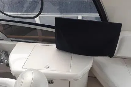 Slide: The Image of 2005 Sea Ray 420 Sedan Bridge interior with seating and storage. - 7