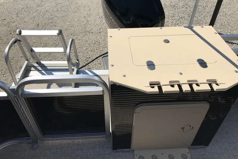 Slide: The Image of 2019 Avalon Venture Fish N Cruise boat with ladder and storage compartment. - 16