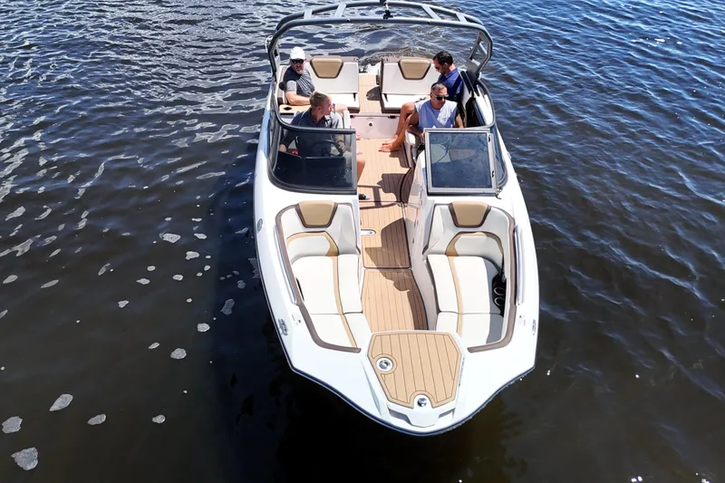 Slide: The Image of 2021 Yamaha Boats 252S on water, featuring spacious seating and sleek design. - 10