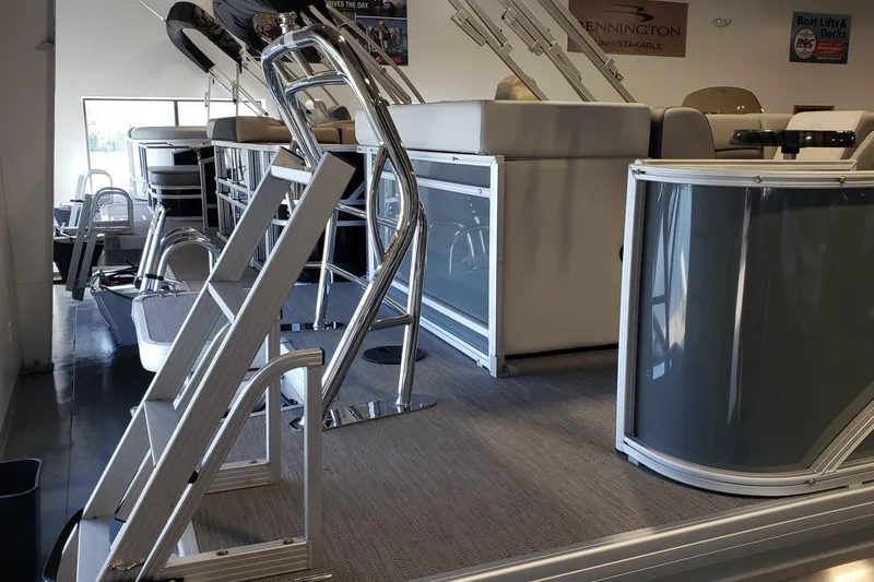 Slide: The Image of Interior view of a 2026 Godfrey 2086C SE pontoon boat with seating and ladder. - 13