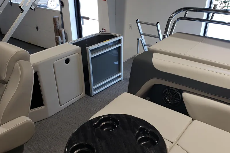 Slide: The Image of Interior of 2026 Godfrey 2086C SE boat with seating, table, and storage. - 4