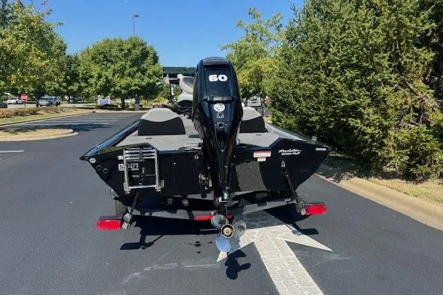 Slide: The Image of 2017 Tracker Pro Team 175 TXW boat with 60 HP engine on a trailer. - 3