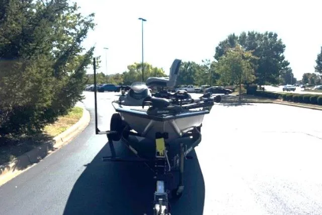 Slide: The Image of 2017 Tracker Pro Team 175 TXW boat on trailer in parking lot. - 4