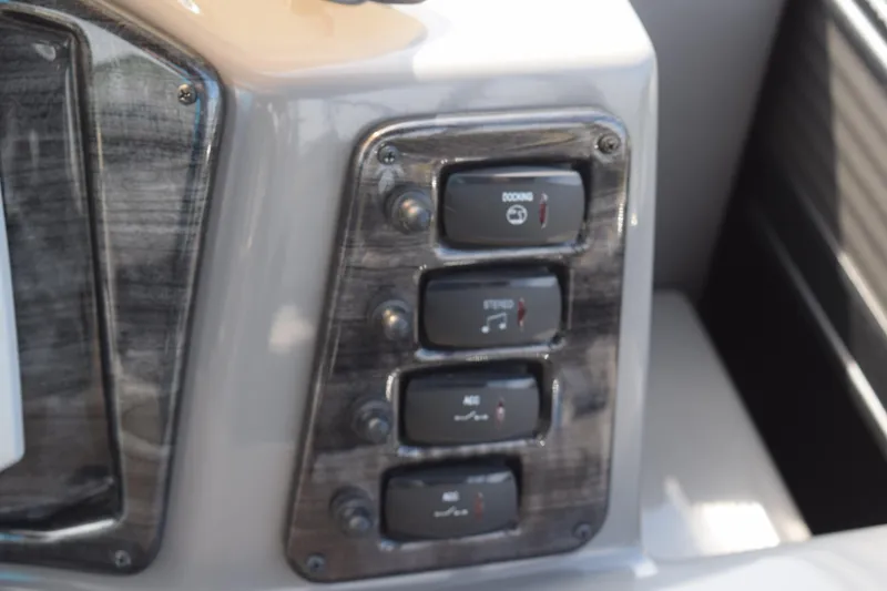 Slide: The Image of Control panel of 2023 Qwest E Class-820 RLS-Lt with labeled switches. - 10