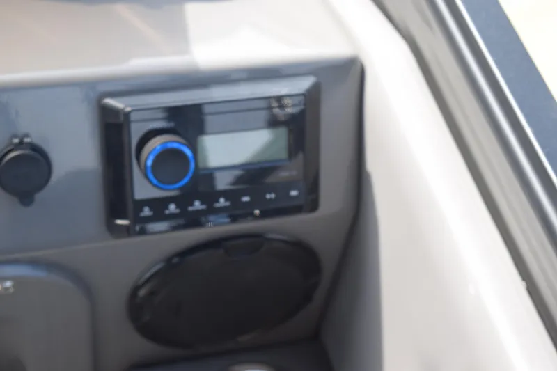 Slide: The Image of Control panel of 2023 Qwest E Class-820 RLS-Lt boat with audio system. - 11