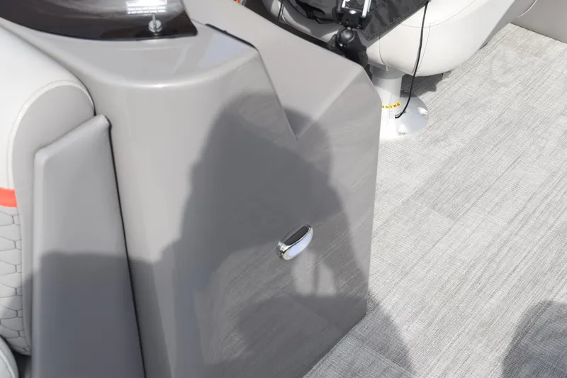 Slide: The Image of 2023 Qwest E Class-820 RLS-Lt boat interior with gray panel and seating. - 15