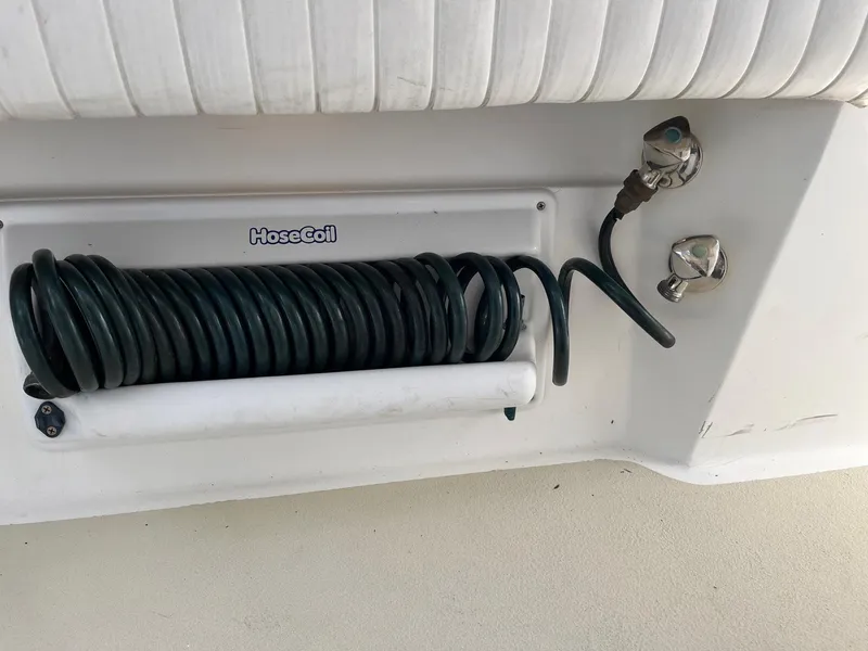 Slide: The Image of Coiled hose on 2005 Strike 35 Sportfisherman boat deck. - 19