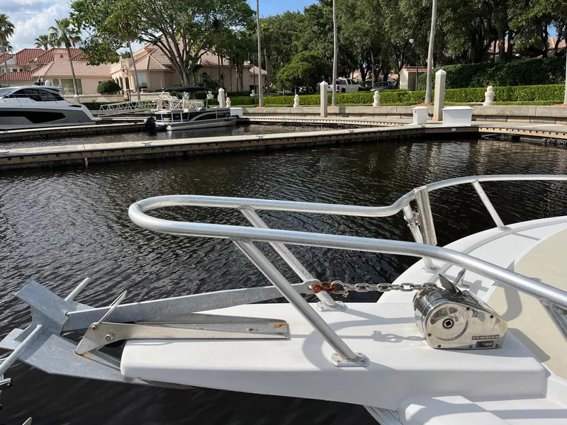 Slide: The Image of Bow of 2005 Strike 35 Sportfisherman docked at marina with lush surroundings. - 7