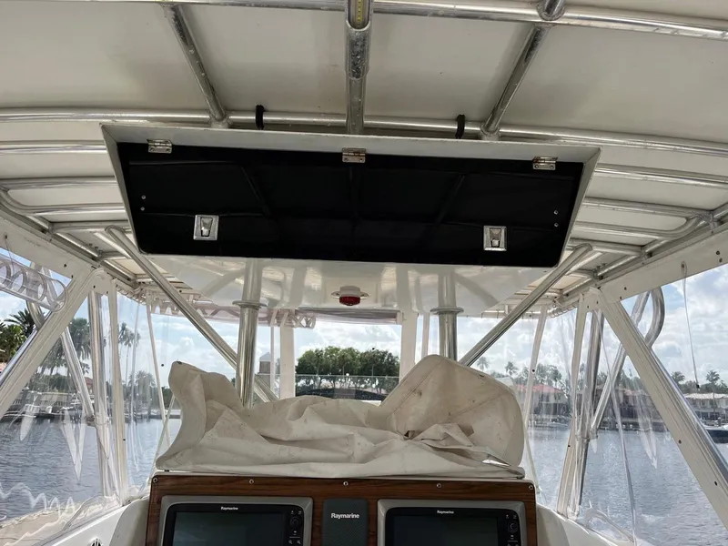 Slide: The Image of 2005 Strike 35 Sportfisherman boat interior with navigation equipment and covered console. - 8