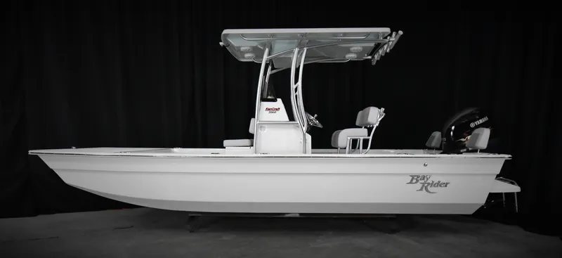 Slide: The Image of 2024 KenCraft 2060 Bay Rider Skiff boat with T-top and outboard motor. - 11