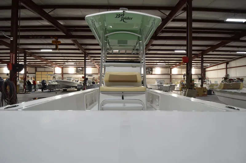 Slide: The Image of 2024 KenCraft 2060 Bay Rider Skiff in a boat manufacturing facility. - 14