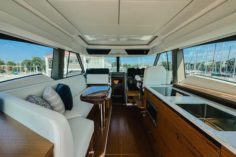 Slide: The Image of Luxurious interior of 2026 Tiara Yachts 43 LE, featuring elegant seating and modern amenities. - 4