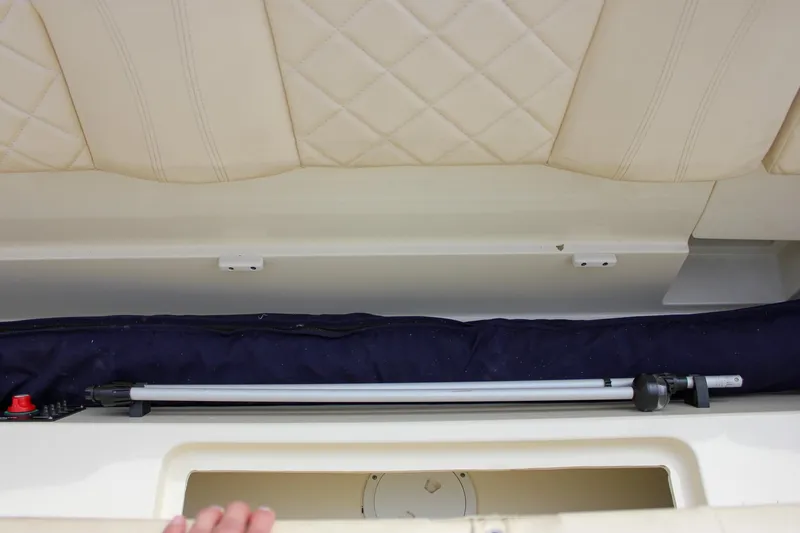 Slide: The Image of 2017 Chris-Craft Capri 27 boat interior with steering wheel and dashboard controls. - 57