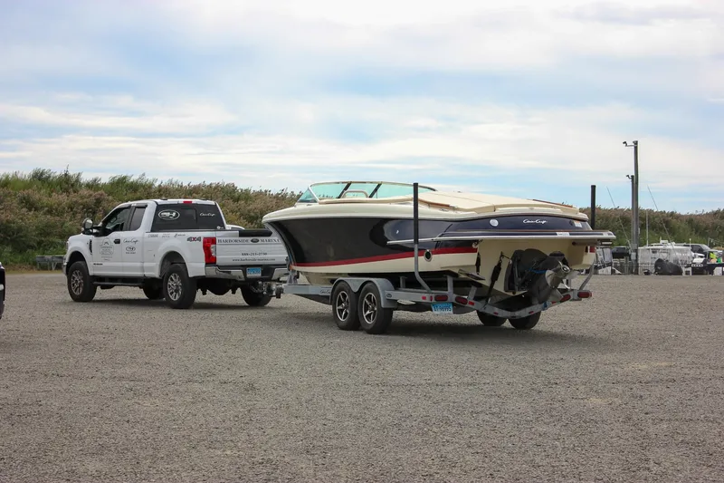 Slide: The Image of 2017 Chris-Craft Capri 27 boat with teak deck and elegant design. - 61