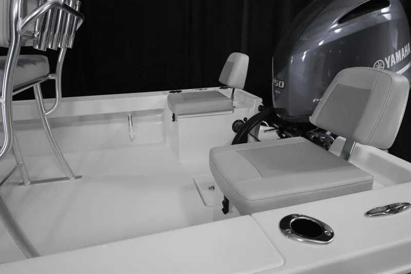 Slide: The Image of 2024 KenCraft 219 Bay Rider Bay boat interior with Yamaha engine and seating. - 11
