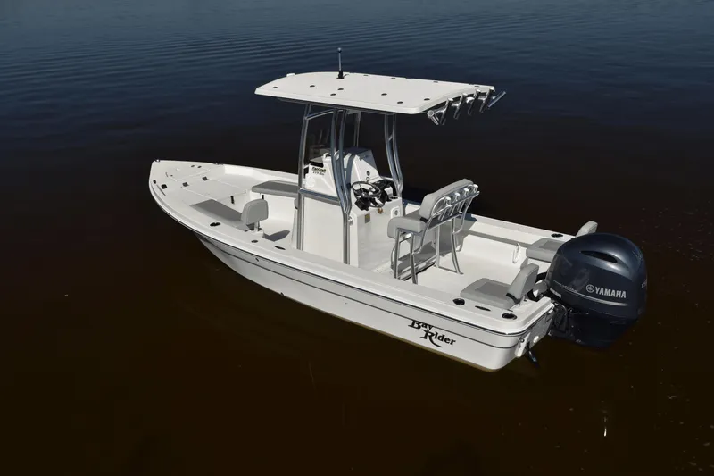 Slide: The Image of 2024 KenCraft 219 Bay Rider Bay boat on calm water. - 6