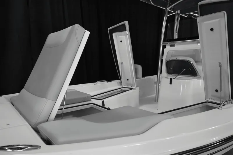 Slide: The Image of 2024 KenCraft 219 Bay Rider Bay boat interior with open storage compartments. - 9
