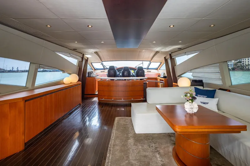 Slide: The Image of Luxurious interior of 2008 Pershing 90 yacht with elegant wood finishes and modern design. - 24