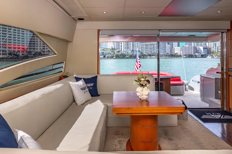 Slide: The Image of Luxurious interior of 2008 Pershing 90 yacht with waterfront view and elegant seating area. - 29