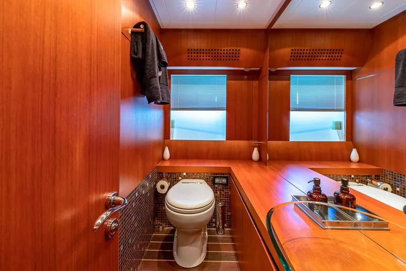 Slide: The Image of Luxurious 2008 Pershing 90 yacht bathroom with wood accents and modern fixtures. - 39
