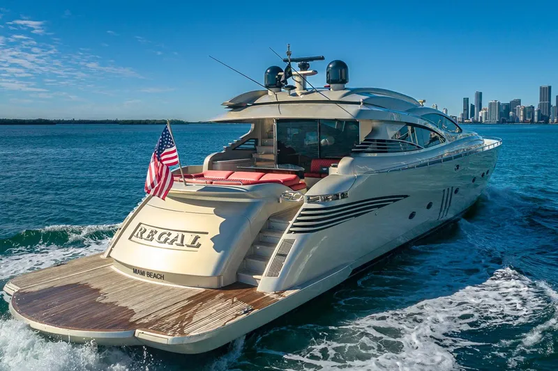 Slide: The Image of Luxury 2008 Pershing 90 yacht cruising near Miami skyline. - 5