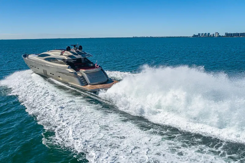 Slide: The Image of Luxurious 2008 Pershing 90 yacht cruising swiftly on open blue waters. - 7