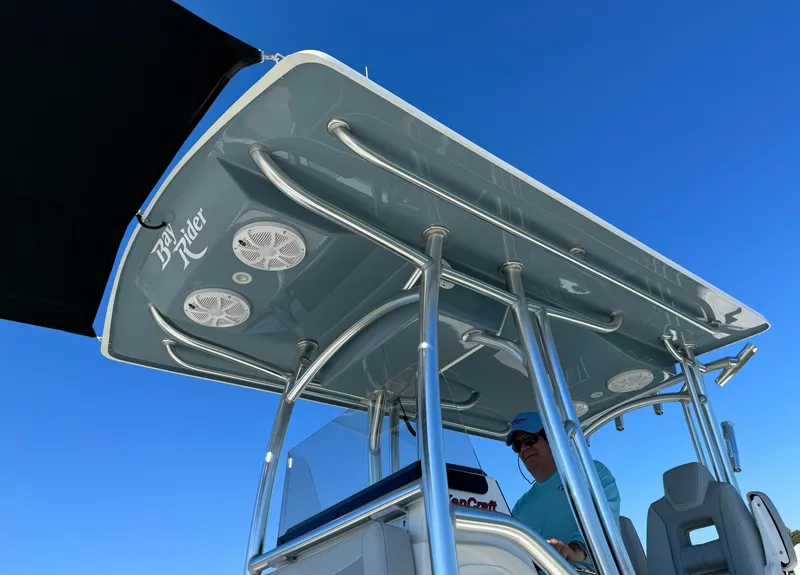 Slide: The Image of 2025 KenCraft 269 Bay boat with T-top and rod holders. - 5