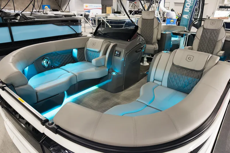 Slide: The Image of 2026 Godfrey Sanpan 23' Split Bench 2300 SBC with luxurious seating and ambient lighting. - 10