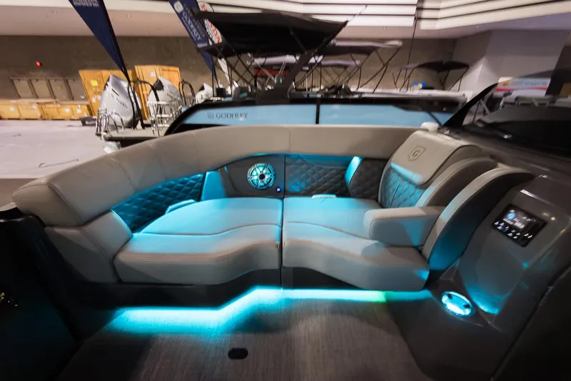 Slide: The Image of Luxurious interior of 2026 Godfrey Sanpan 23' Split Bench with ambient lighting. - 11