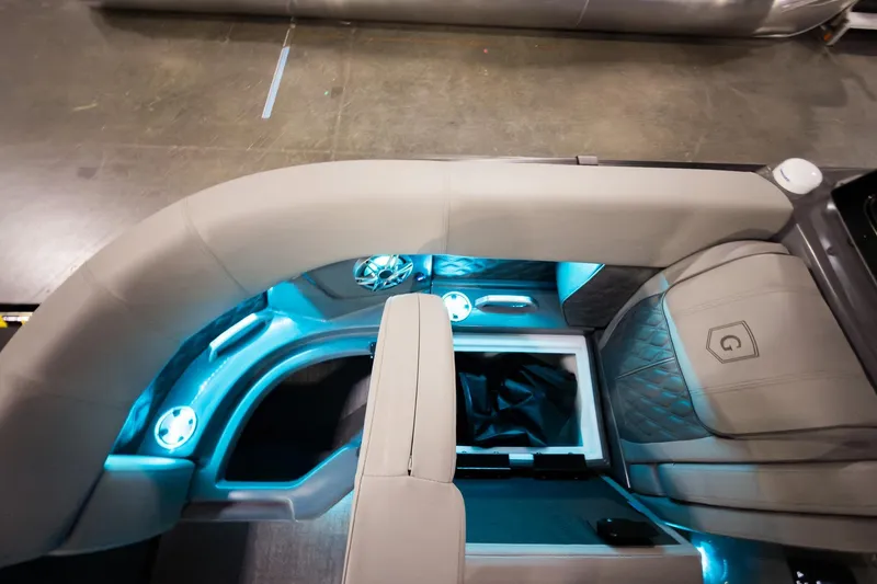 Slide: The Image of 2026 Godfrey Sanpan 23' Split Bench interior with ambient lighting and luxurious seating. - 12