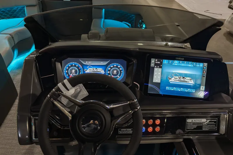 Slide: The Image of 2026 Godfrey Sanpan 23' Split Bench dashboard with advanced digital displays and controls. - 15