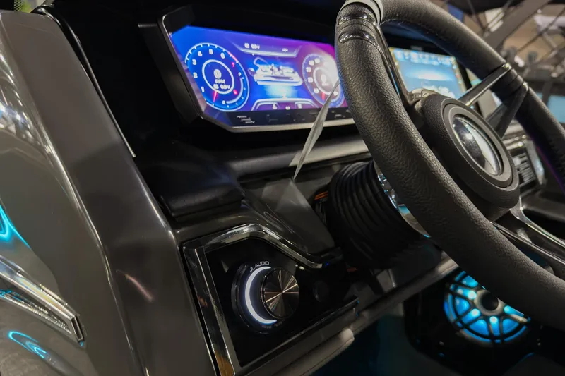 Slide: The Image of Steering wheel and dashboard of 2026 Godfrey Sanpan 23' Split Bench - 2300 SBC boat. - 16