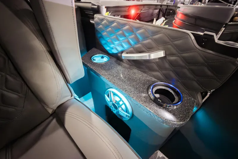 Slide: The Image of Luxurious interior of 2026 Godfrey Sanpan 23' Split Bench with illuminated cup holders. - 23