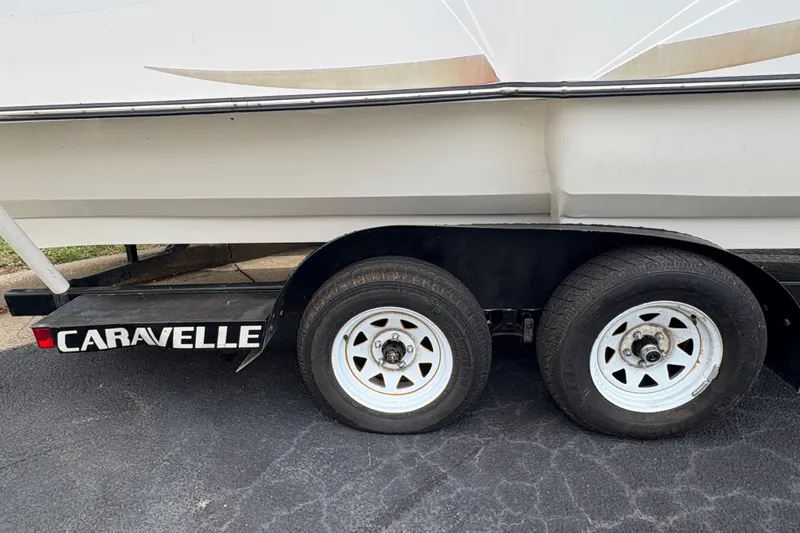 Slide: The Image of Trailer with dual wheels labeled "Caravelle," part of a 2017 Razor 238 PF XL. - 5